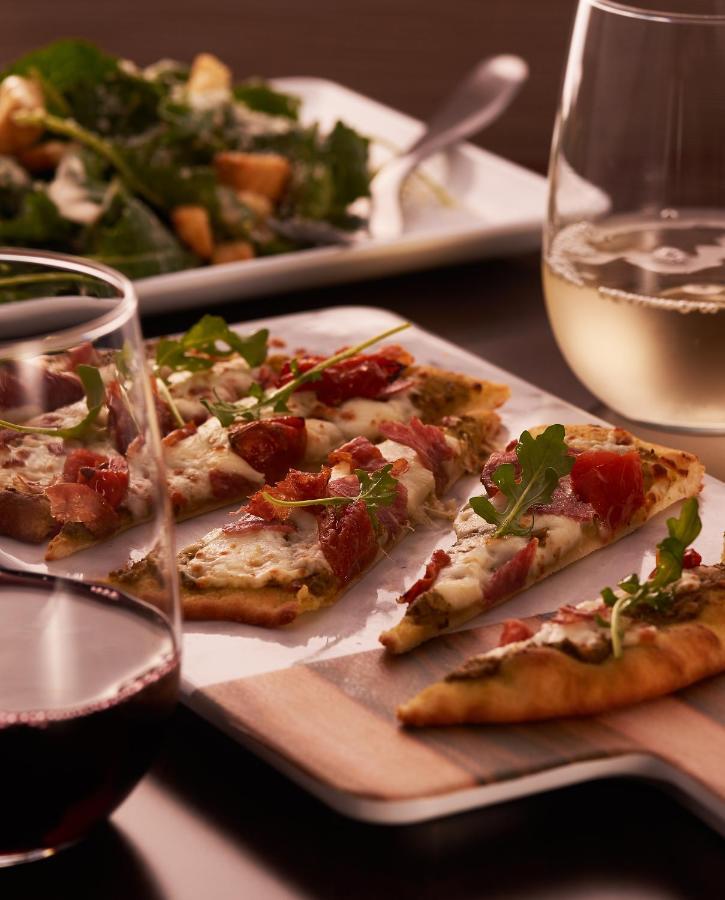 Hyatt Place Jaipur Malviya Nagar Bagian luar foto A flatbread with prosciutto and mozzarella